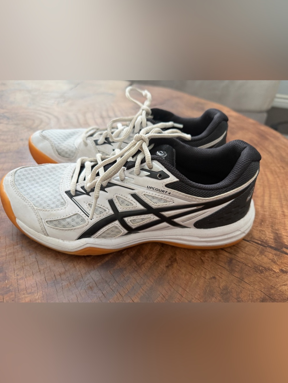 Asics Upcourt 4 women’s Volleyball Shoes in White and Black